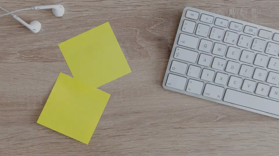 Sticky notes next to a keyboard