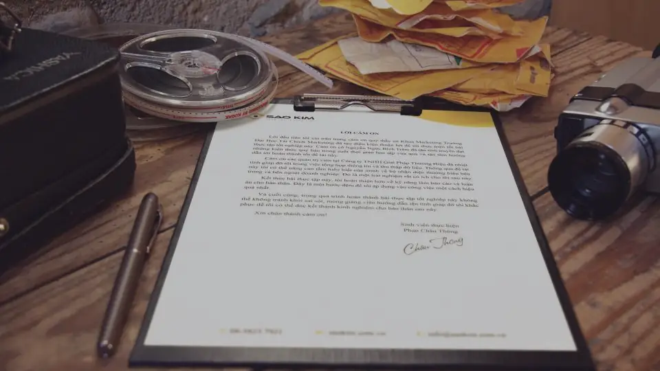 A signed letter on a clipboard
